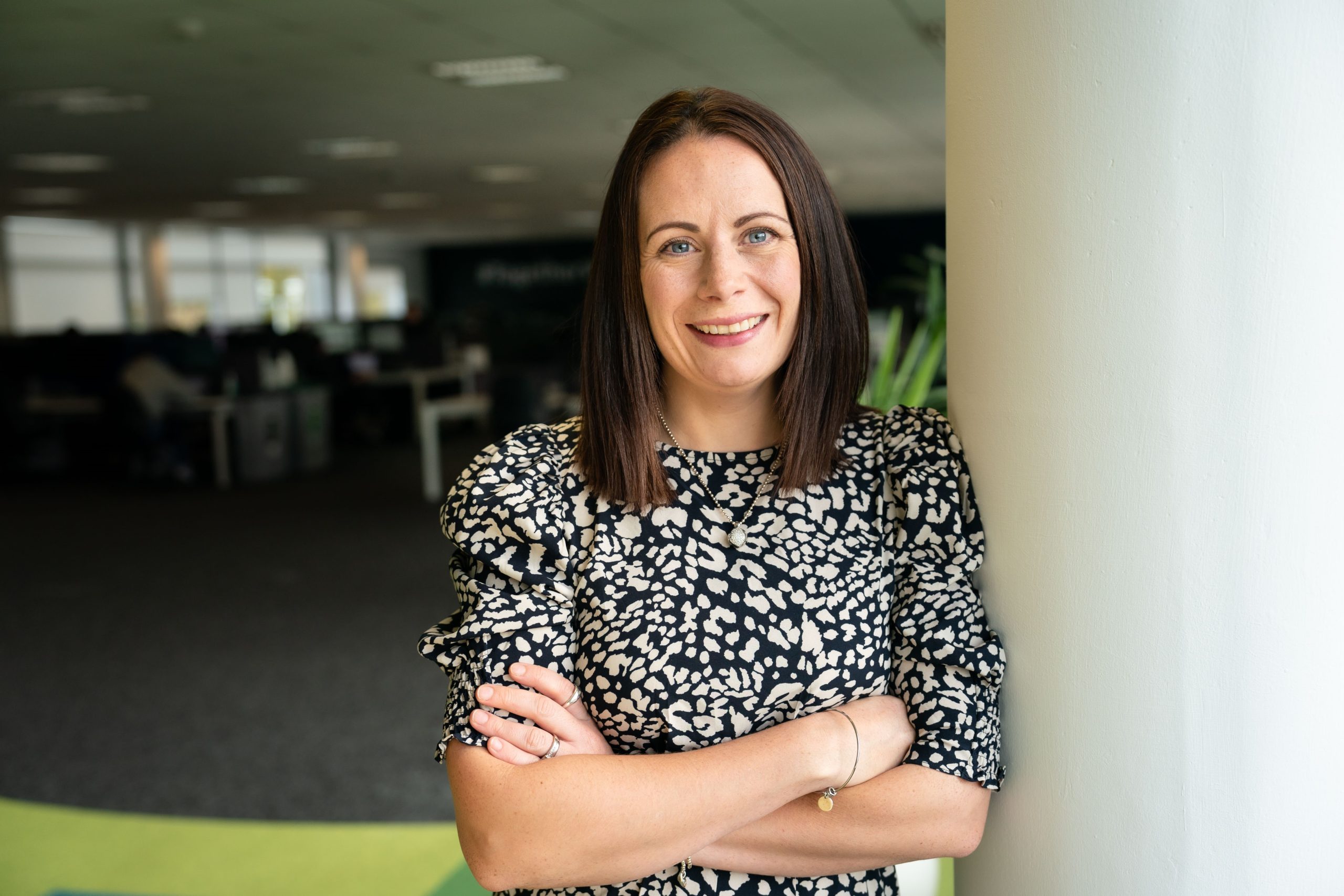 Gemma Monaghan standing and smiling at camera